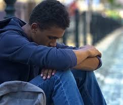 Burned out Youth sitting on steps