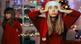 Navigating Holiday Eating With Confidence: A Guide for Expecting and New Moms 1 mom stressed over holiday party
